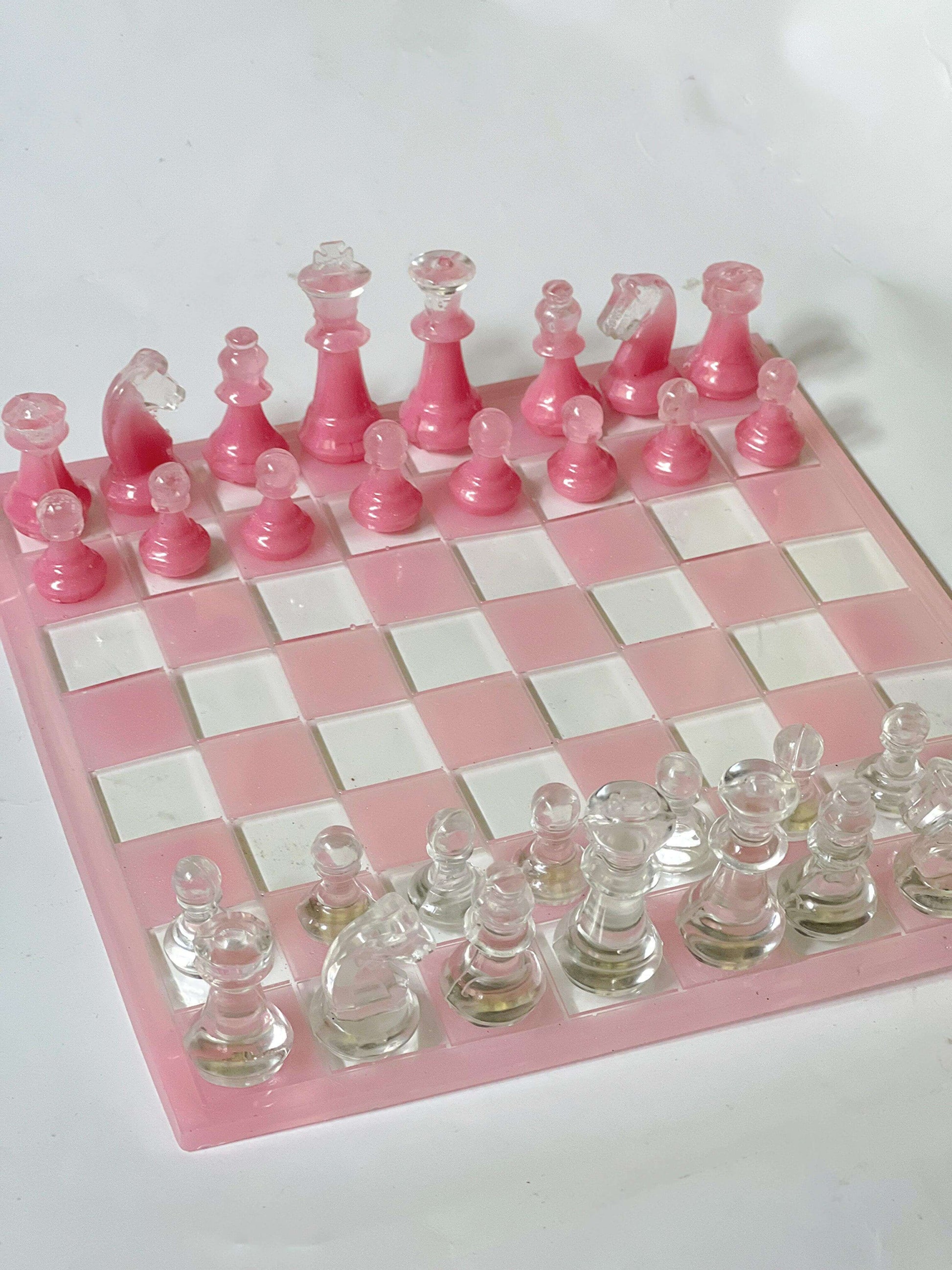 A chess board set up for a strategic game in hyper realistic brilliant neon  rainbow cyber punk